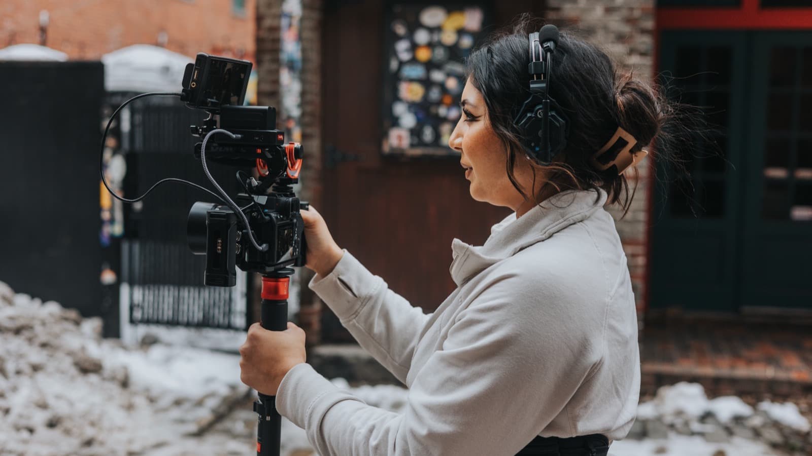 A Skytona filmmaker operating a cinema rig on location.